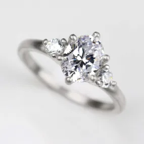 8x6mm Prong-set Oval Three Stone Ring